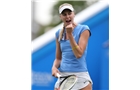 EASTBOURNE, ENGLAND - JUNE 14: Naomi Broady of Great Britain celebrates a point against Belinda Bencic of Switzerland during their Women's Singles first round qualifying match on day one of the Aegon International at Devonshire Park on June 14, 2014 in Eastbourne, England.  (Photo by Steve Bardens/Getty Images)